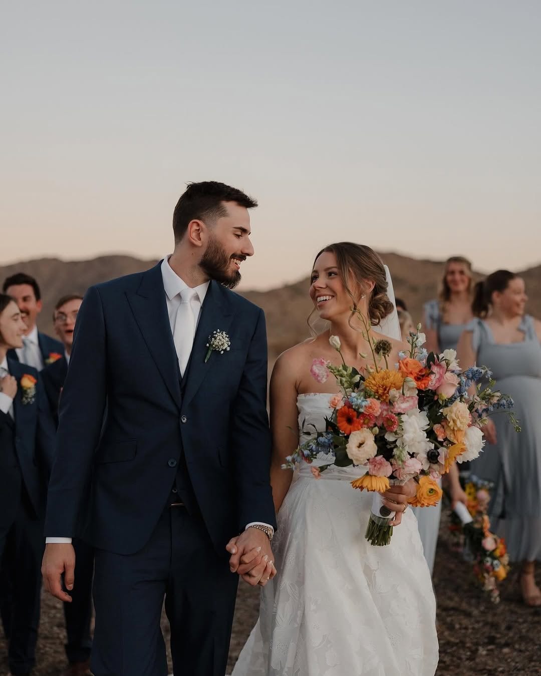 Bride and groom with wedding bouquet